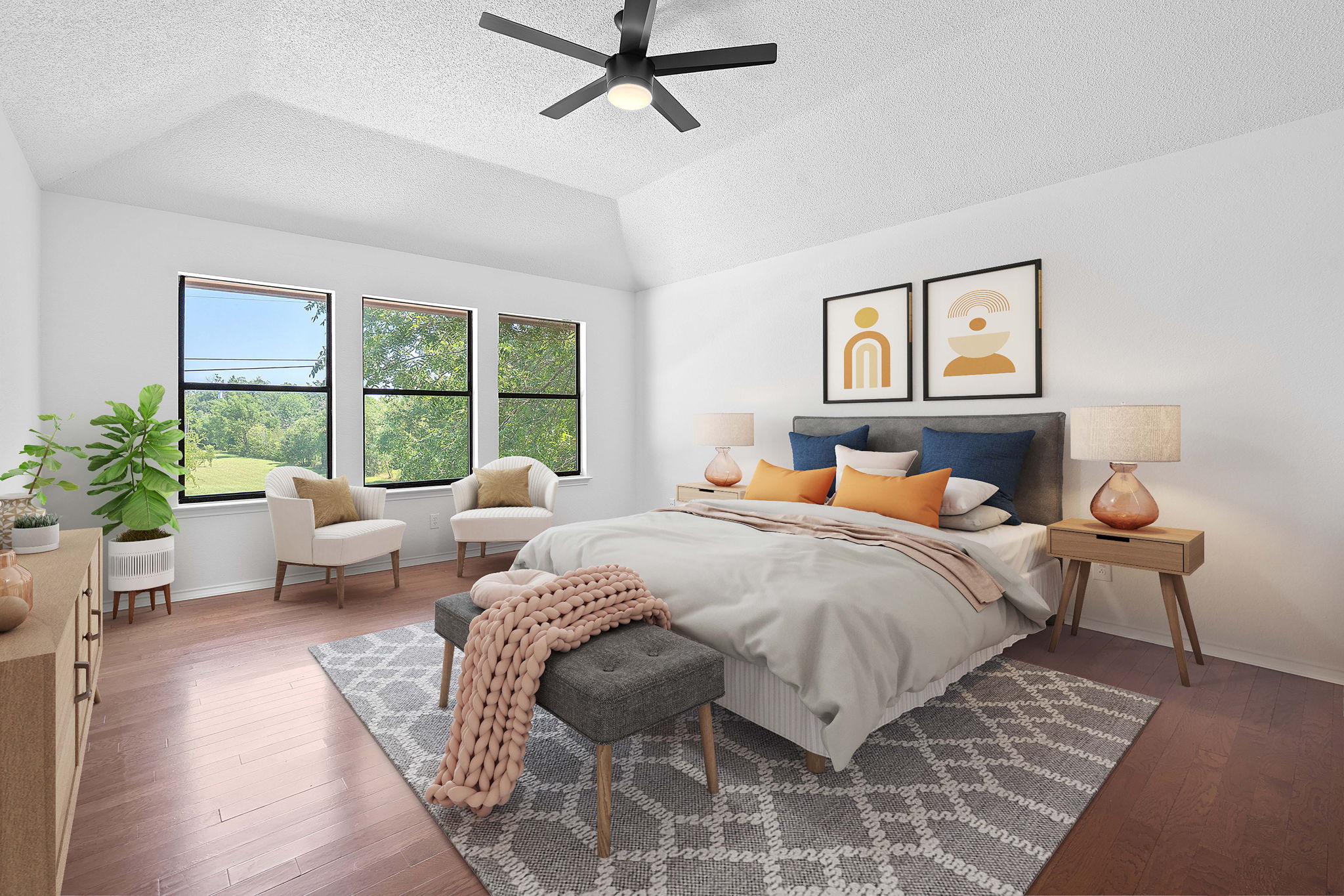 1106 Split Oak Cove Pflugerville, TX 78660 - Photo 10 of 27 a bedroom with a bed a couch and potted plant