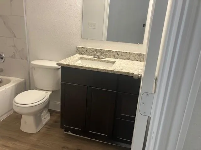a bathroom with a sink and a toilet