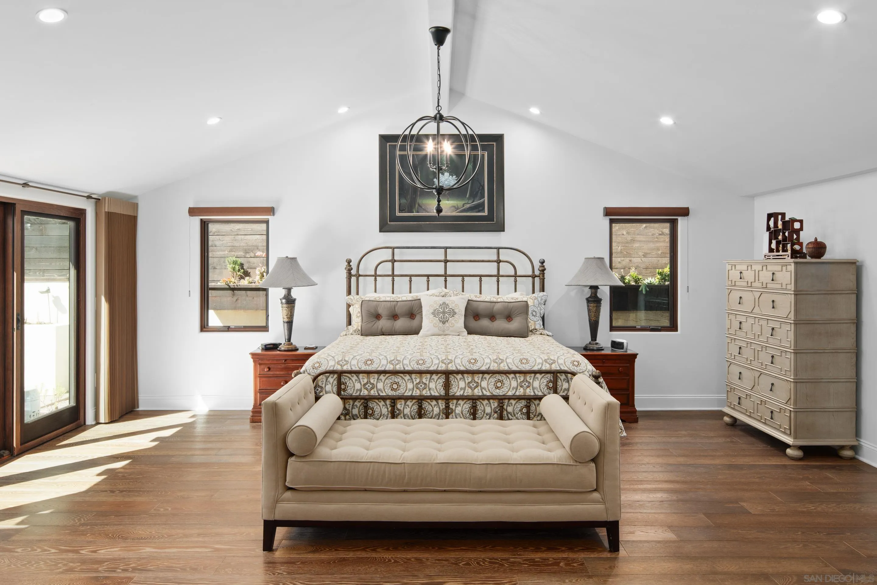 3537 Silvergate Place San Diego, CA 92106 - Photo 15 of 43 a bedroom with a bed mirror and couch