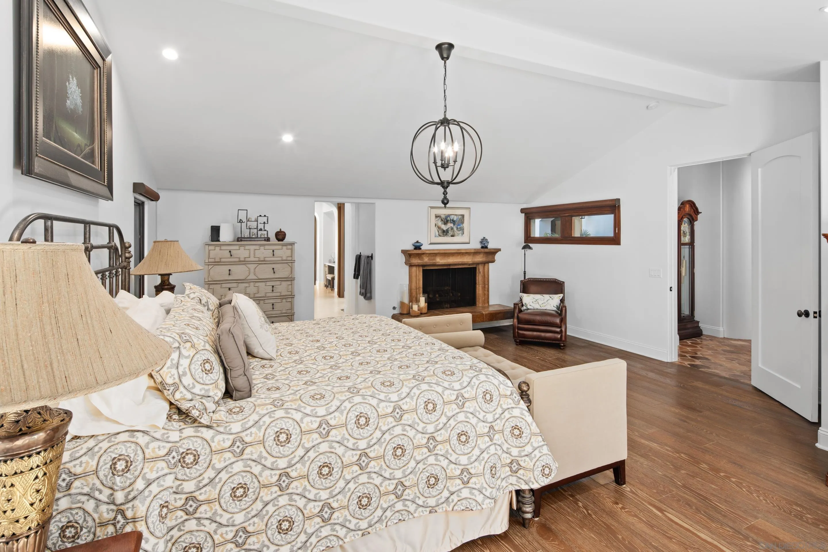 3537 Silvergate Place San Diego, CA 92106 - Photo 17 of 43 a bedroom with a bed and a chandelier