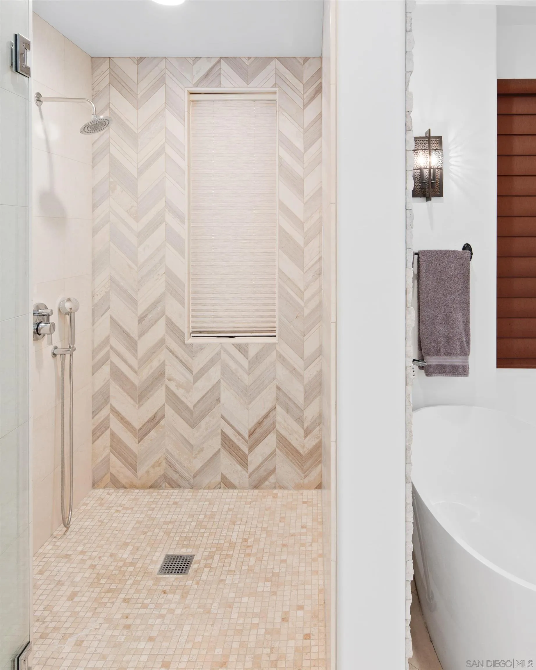 3537 Silvergate Place San Diego, CA 92106 - Photo 19 of 43 a bathroom with a bathtub and shower