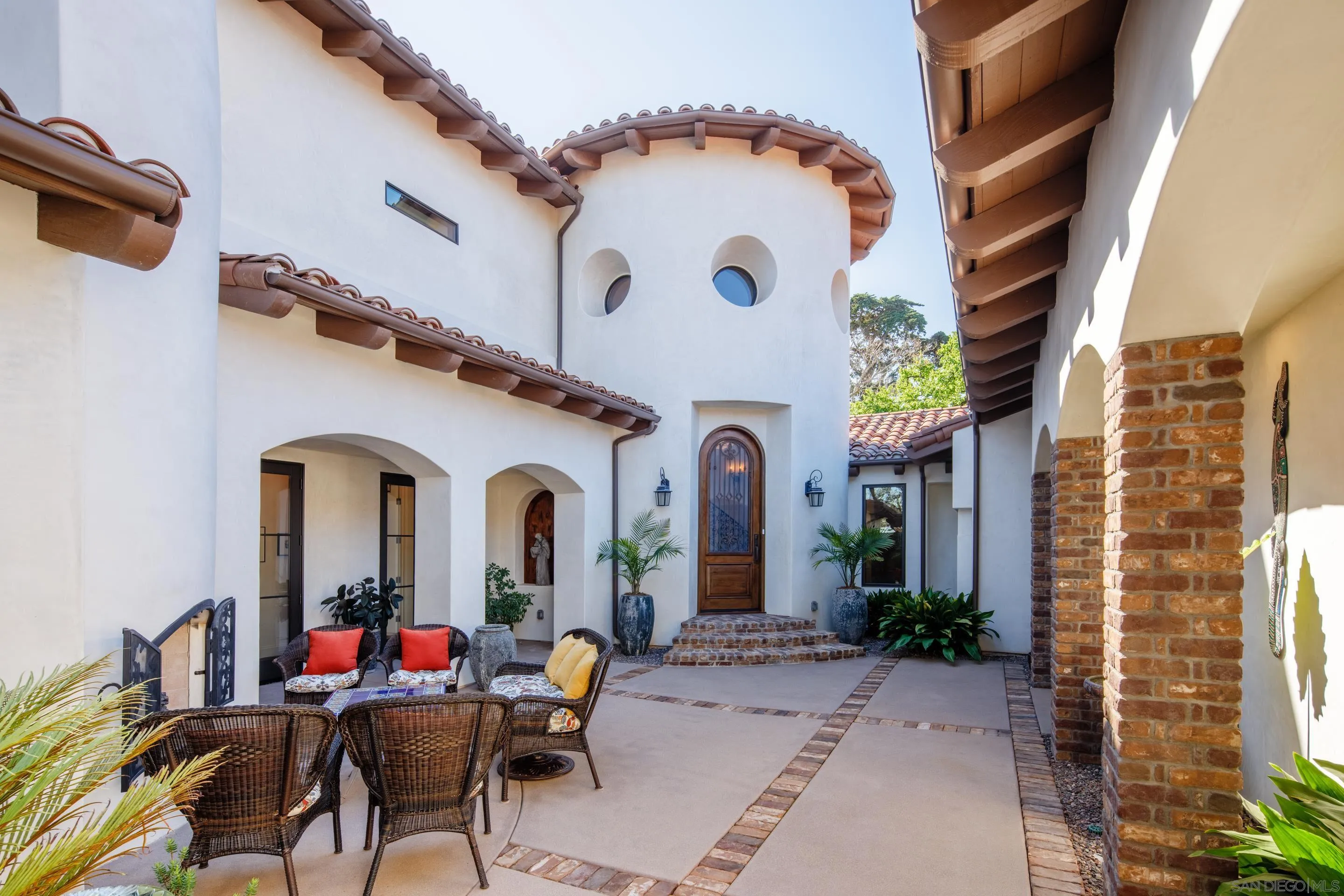 3537 Silvergate Place San Diego, CA 92106 - Photo 2 of 43 a group of people sitting in front of a building