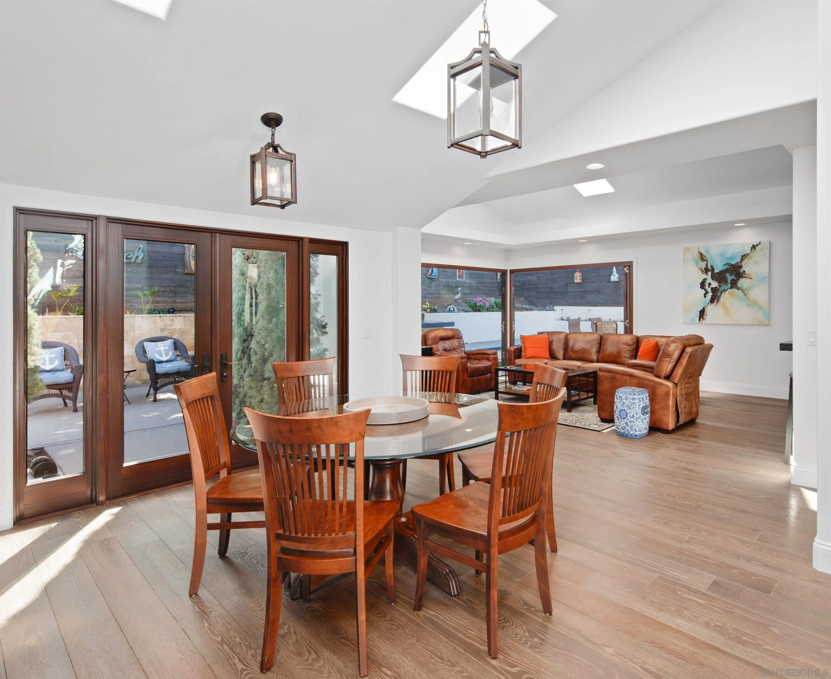 3537 Silvergate Place San Diego, CA 92106 - Photo 22 of 43 a view of a dining room with furniture window and wooden floor