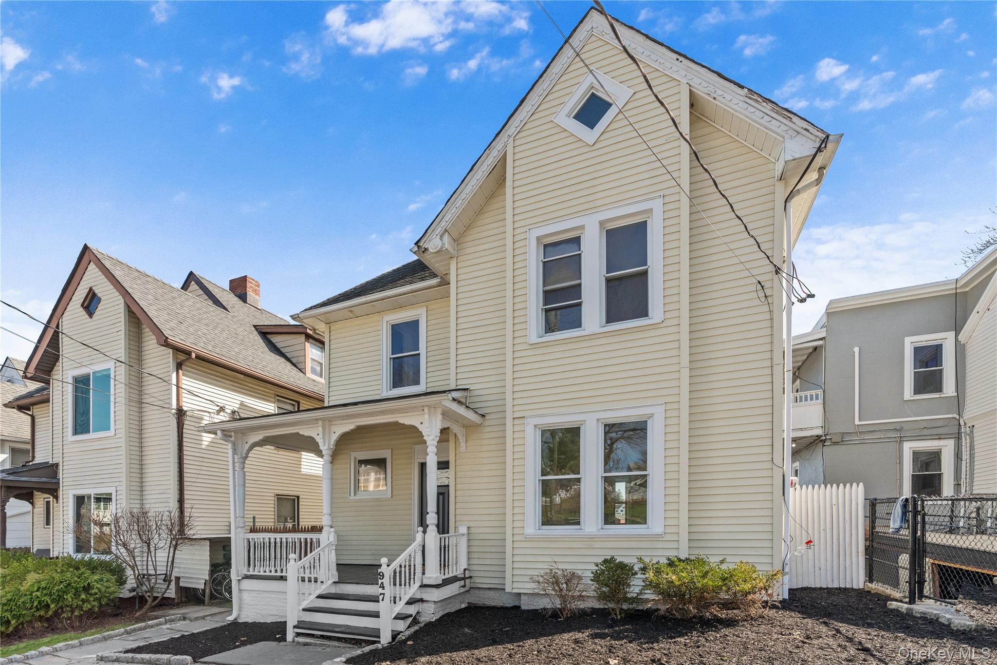 947 Diven Street Peekskill, NY 10566 - Photo 1 of 28 a front view of a house with a porch