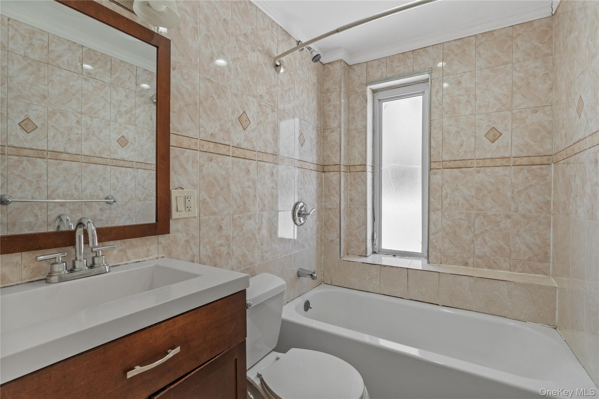 947 Diven Street Peekskill, NY 10566 - Photo 15 of 28 a bathroom with a granite countertop sink toilet and shower