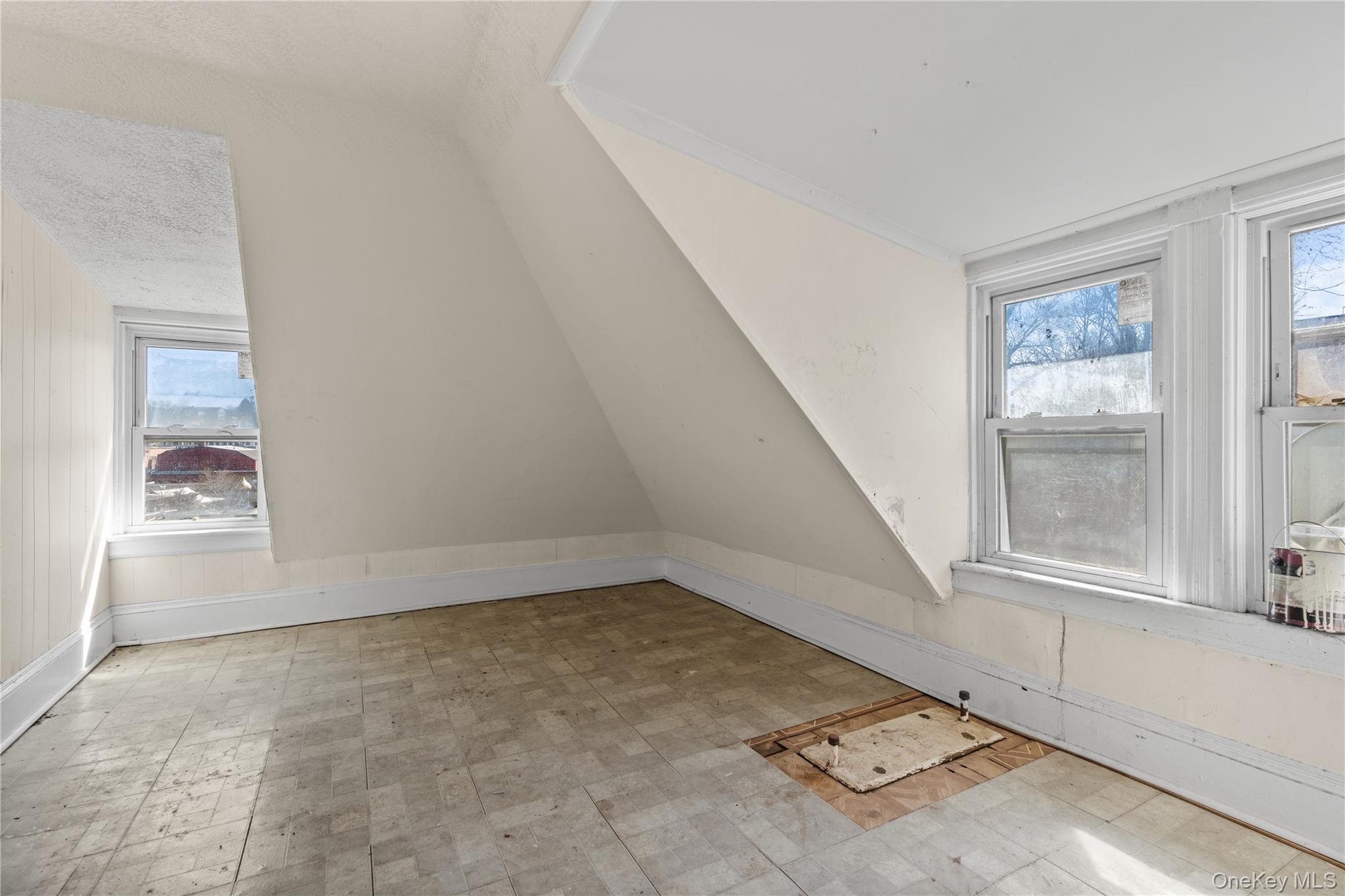 947 Diven Street Peekskill, NY 10566 - Photo 17 of 28 an empty room with windows
