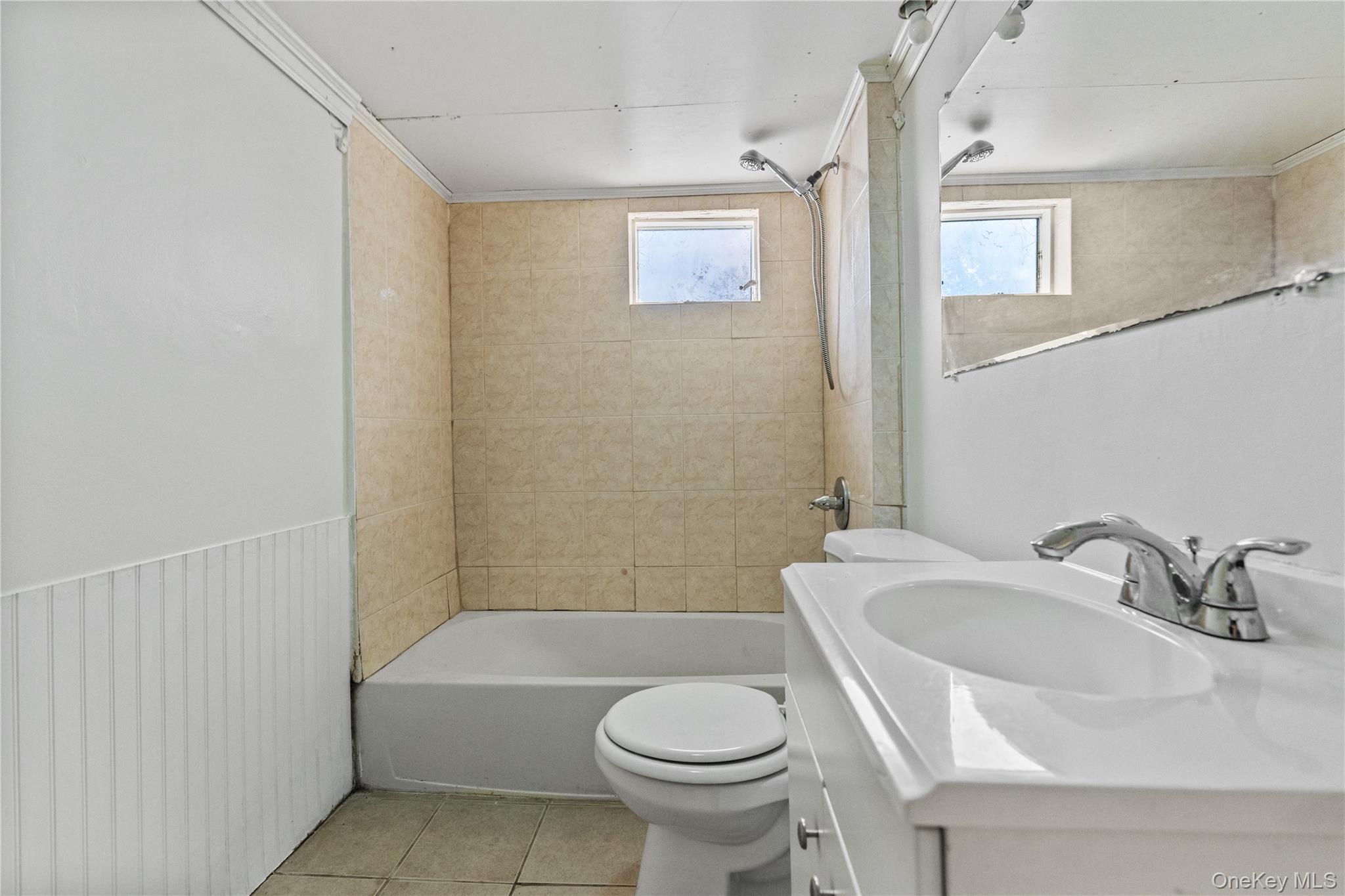 947 Diven Street Peekskill, NY 10566 - Photo 23 of 28 a bathroom with a sink and toilet