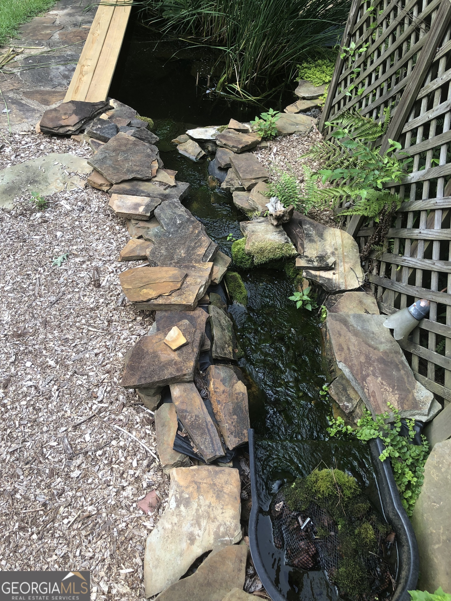 1744 Campbell Road Covington, GA 30014 - Photo 22 of 29 a view of a backyard of the house