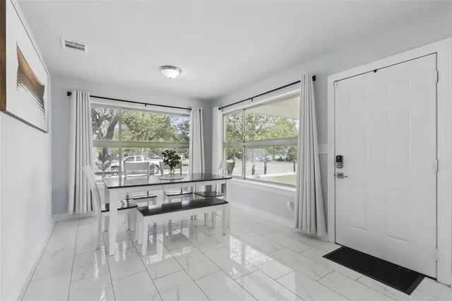 a large living room with a large window