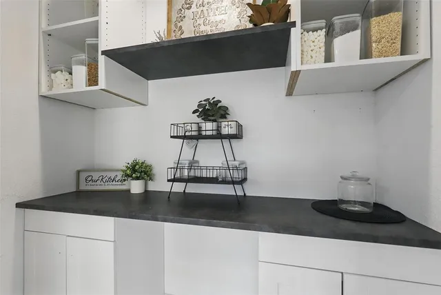 a vase of flowers sitting on a table