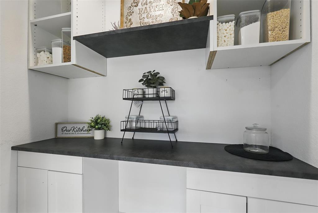 5200 Barbara Road River Oaks, TX 76114 - Photo 14 of 40 a vase of flowers sitting on a table