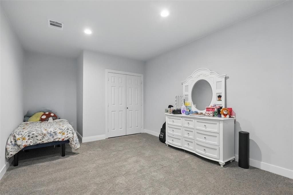 5200 Barbara Road River Oaks, TX 76114 - Photo 30 of 40 a living room with furniture and a dresser