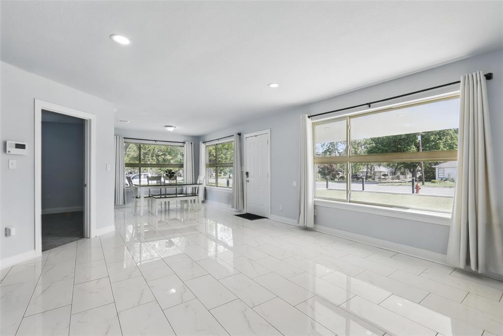 5200 Barbara Road River Oaks, TX 76114 - Photo 8 of 40 a room with natural light and glass door