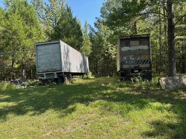 a view of a house with a big yard