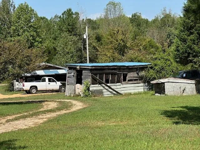 a view of a golf course with a lake
