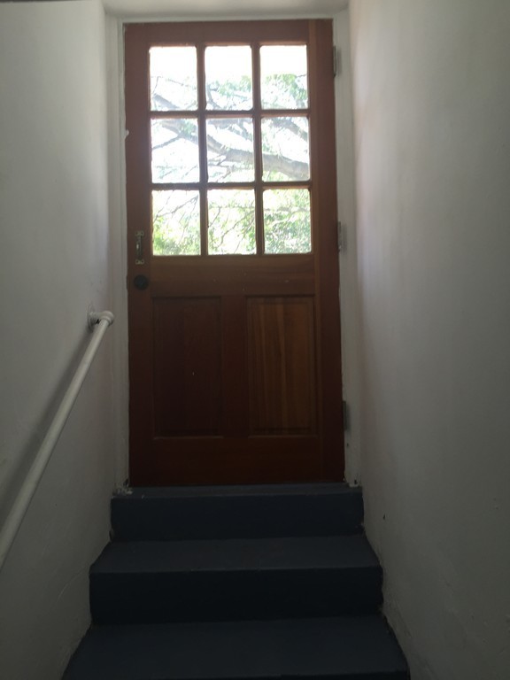 28 Bulfinch Terrace Lynn, MA 01902 - Photo 19 of 30 a view of hallway with wooden floor and white walls