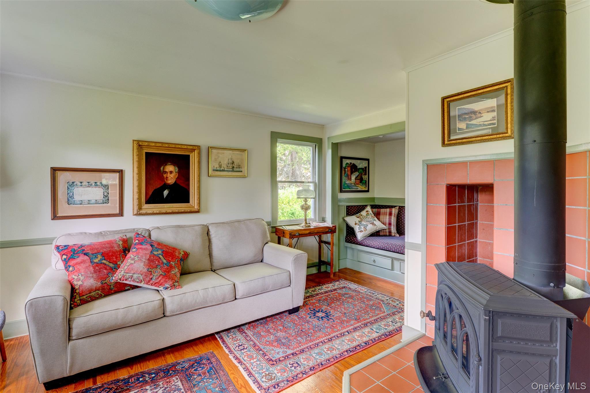 182 Lcpl Jacob Beisel Road Lackawaxen, PA 18435 - Photo 11 of 35 Living room featuring a wood stove and wood finished floors