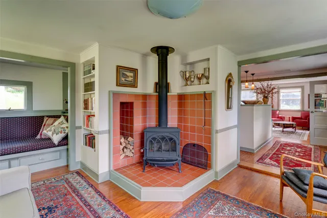 a living room with furniture and a rug