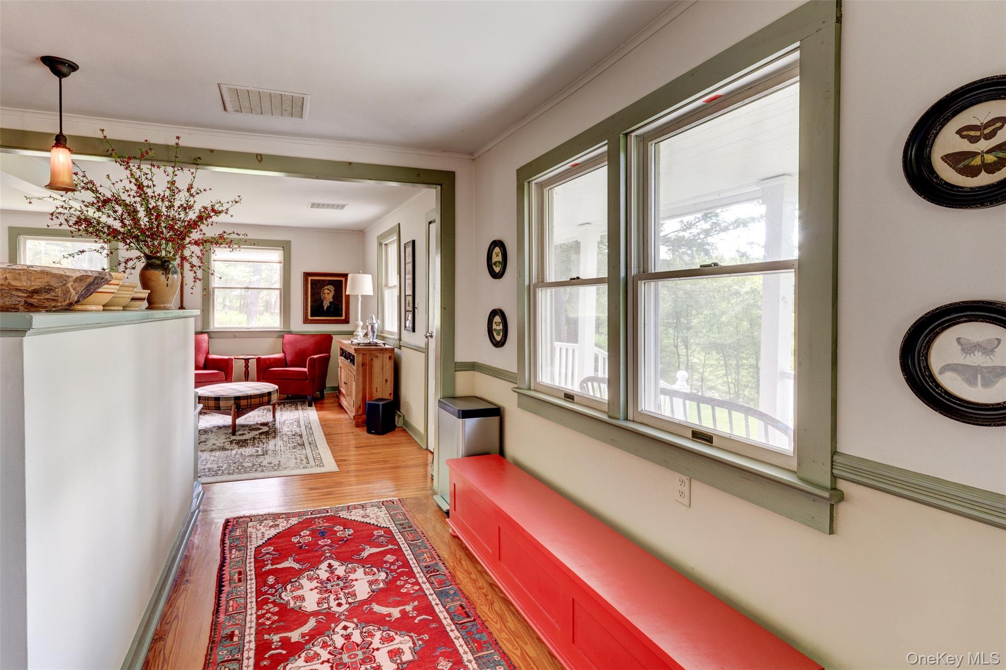 182 Lcpl Jacob Beisel Road Lackawaxen, PA 18435 - Photo 16 of 35 Hallway with light wood-type flooring and ornamental molding