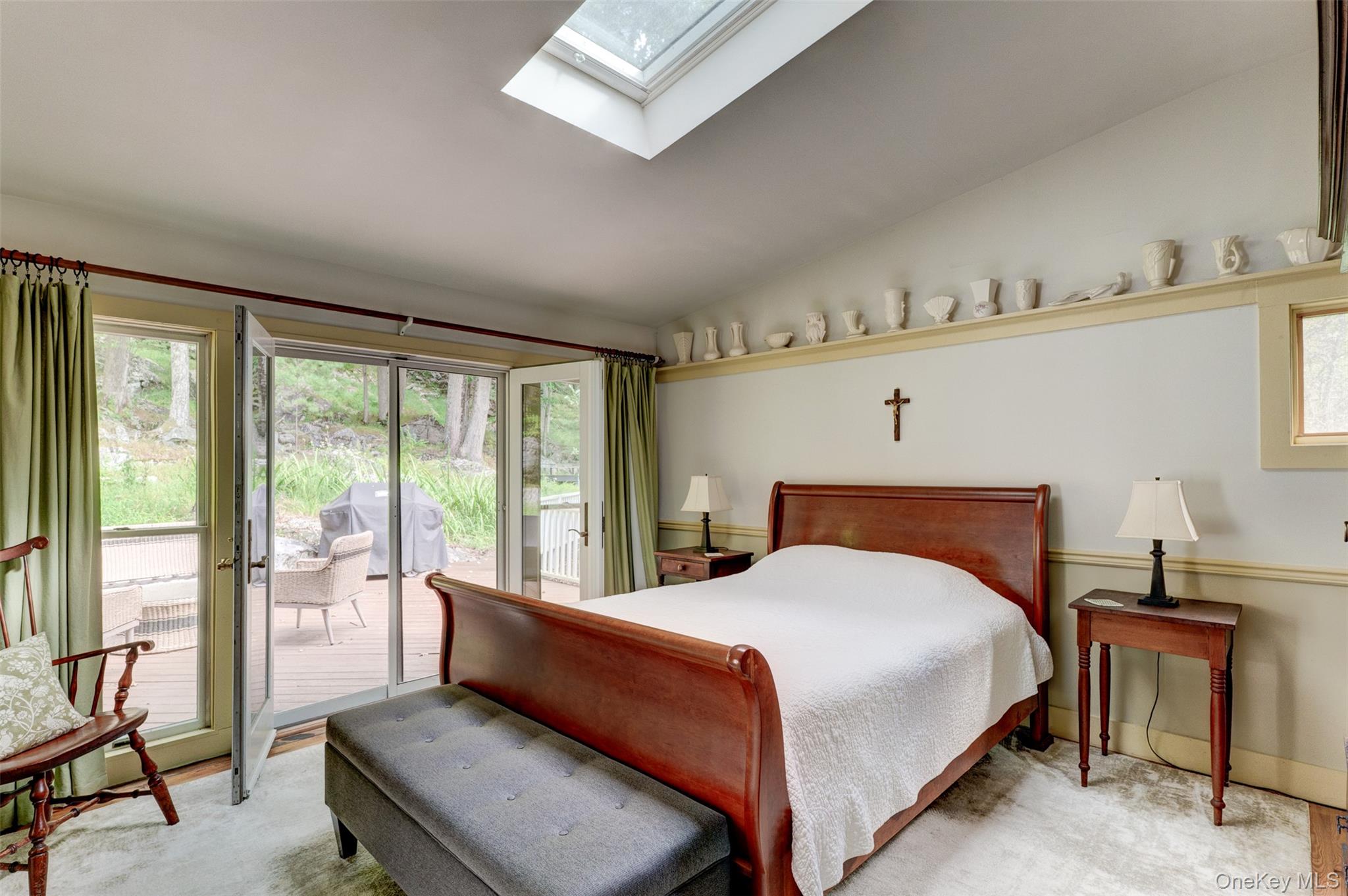 182 Lcpl Jacob Beisel Road Lackawaxen, PA 18435 - Photo 20 of 35 Bedroom featuring lofted ceiling, a skylight, and access to outside