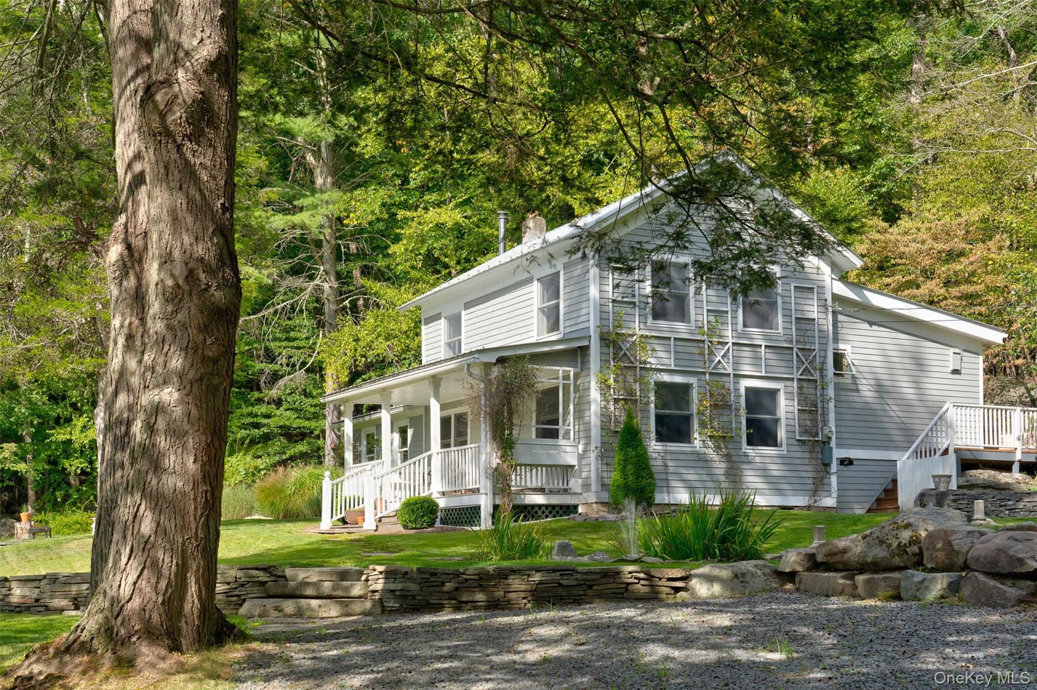 182 Lcpl Jacob Beisel Road Lackawaxen, PA 18435 - Photo 3 of 35 View of front of home featuring covered porch and stairway