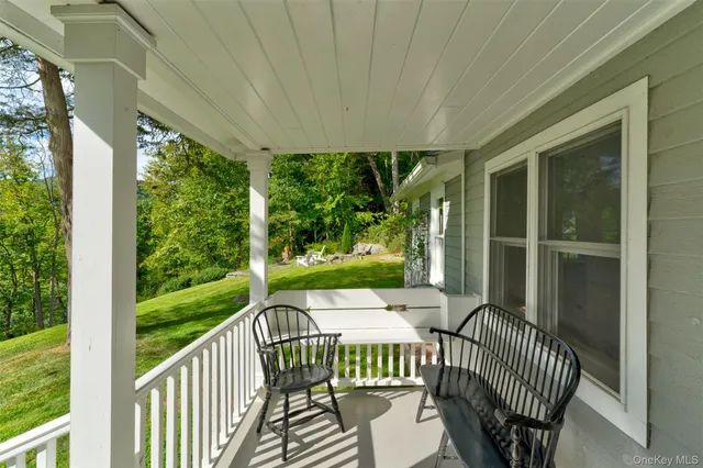 a view of a two chair in the balcony