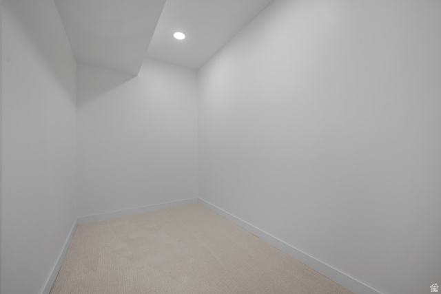 7238 South 525 East Midvale, UT 84047 - Photo 24 of 29 Compact interior space featuring neutral wall tones, recessed lighting, and light-toned carpeting