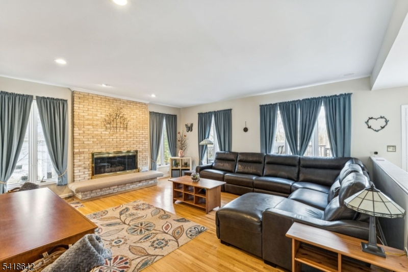 11 North Ridge Road Denville, NJ 07834 - Photo 19 of 43 a living room with furniture and a large window