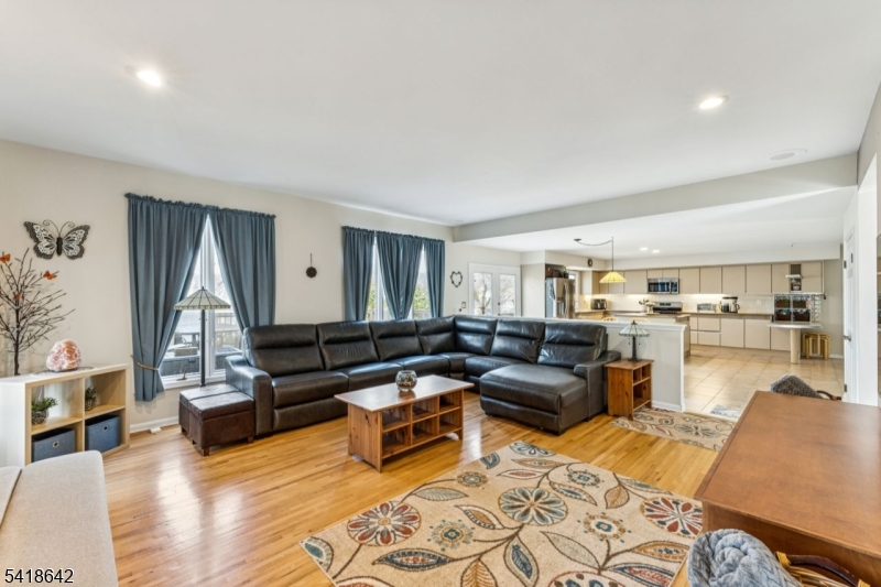 11 North Ridge Road Denville, NJ 07834 - Photo 20 of 43 a living room with furniture and a wooden floor
