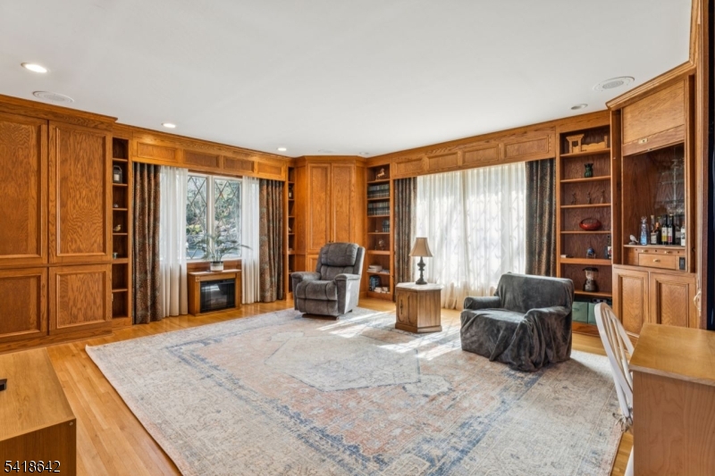 11 North Ridge Road Denville, NJ 07834 - Photo 25 of 43 a living room with furniture and large windows