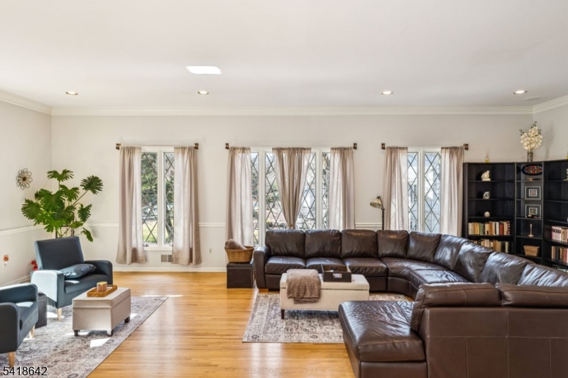 11 North Ridge Road Denville, NJ 07834 - Photo 4 of 43 a living room with furniture and wooden floor