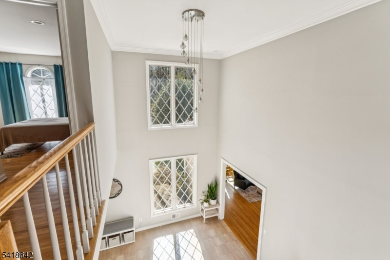 11 North Ridge Road Denville, NJ 07834 - Photo 42 of 43 a view of an entryway with wooden floor and windows