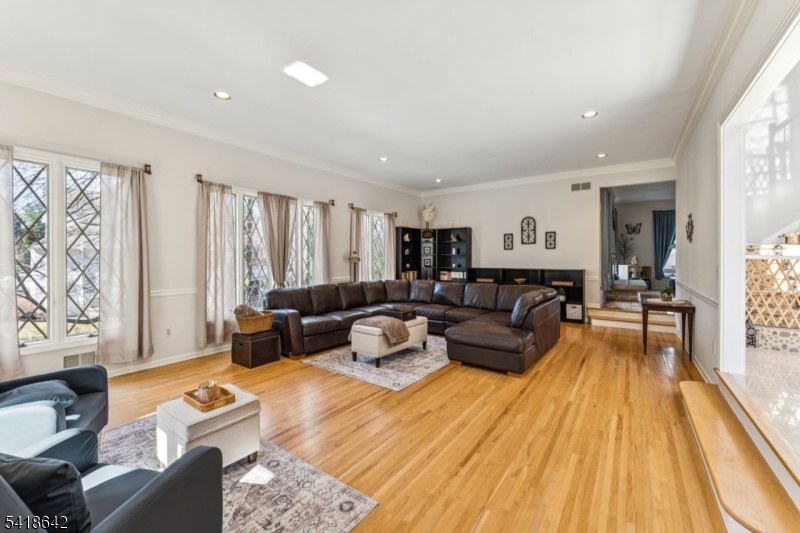 11 North Ridge Road Denville, NJ 07834 - Photo 5 of 43 a living room with furniture and a wooden floor
