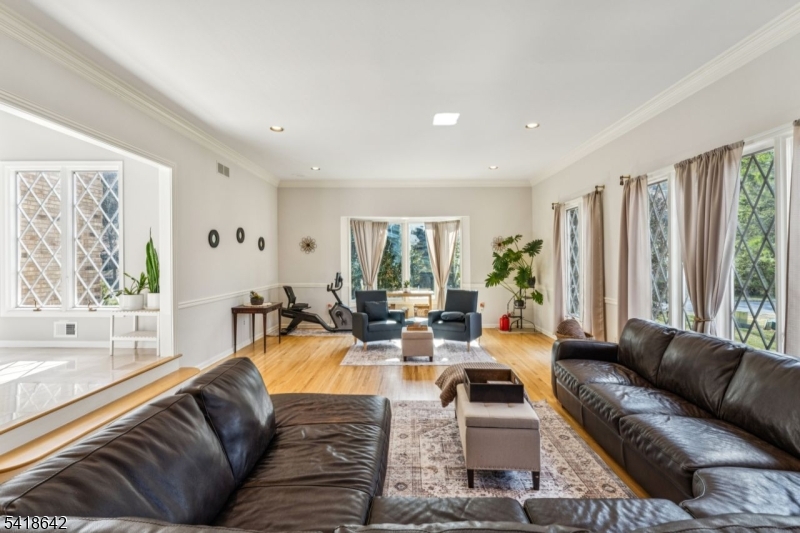11 North Ridge Road Denville, NJ 07834 - Photo 6 of 43 a living room with furniture and large windows