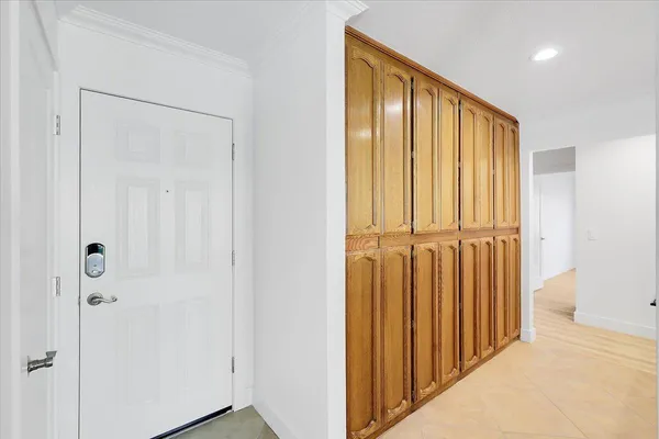 a white refrigerator freezer sitting in a kitchen