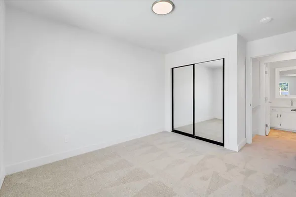 a view of a swimming pool with outdoor seating and plants