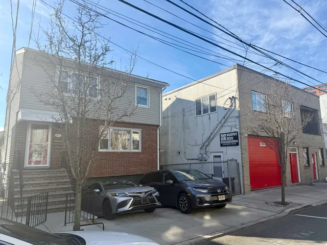 a car parked in front of a building