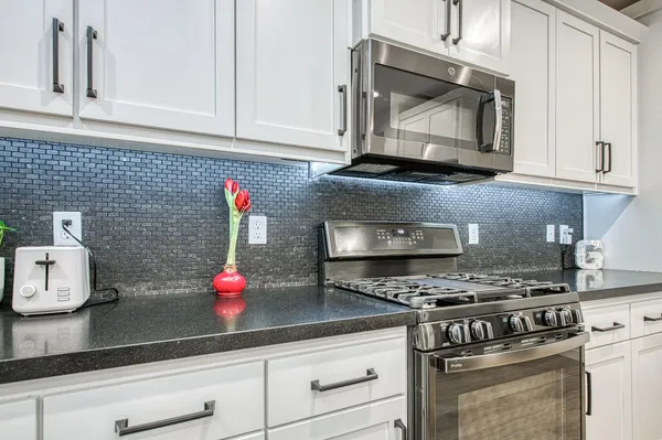 a bed room with furniture and a window