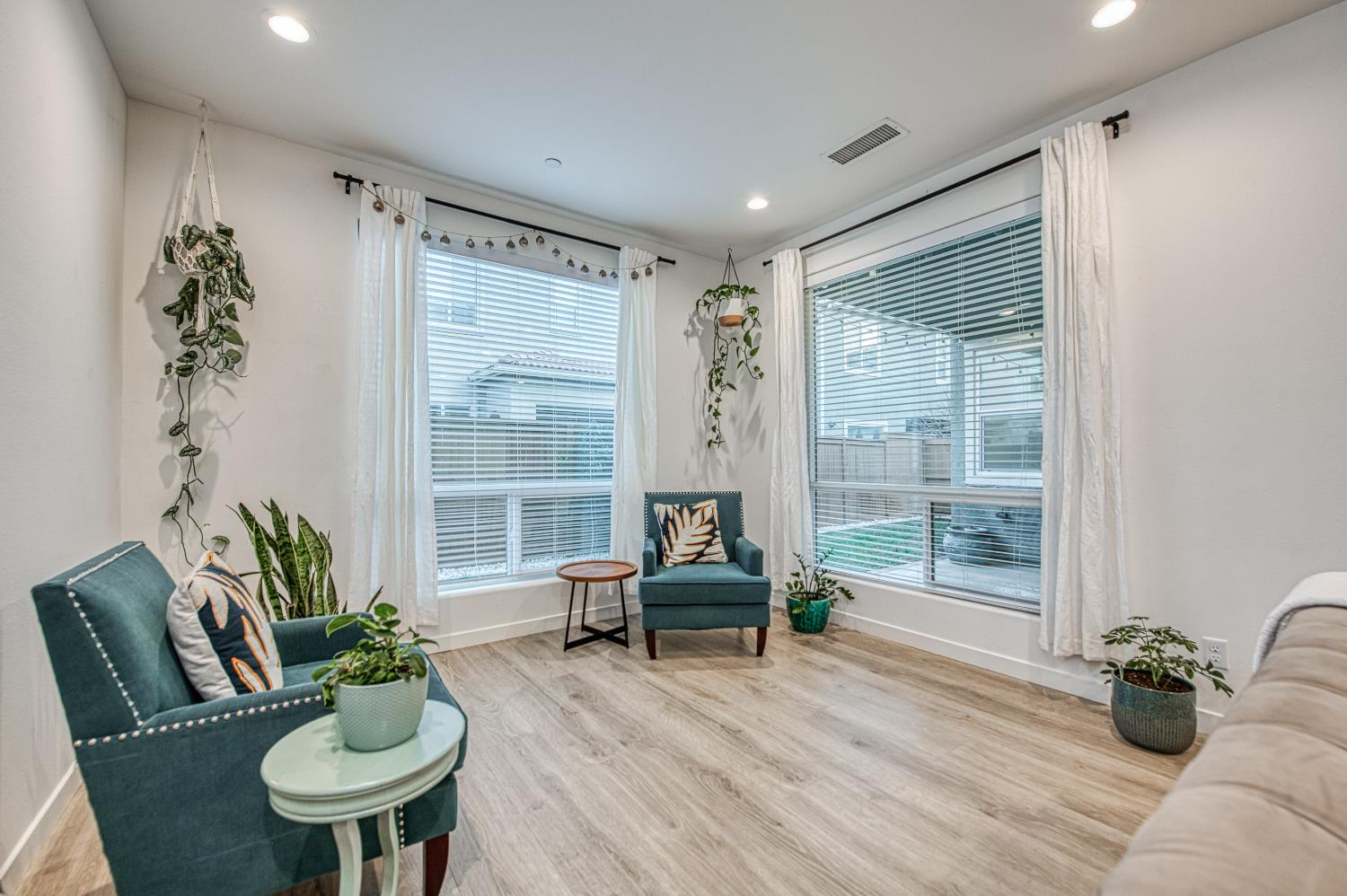 4311 San Miguel Road Madera, CA 93636 - Photo 21 of 79 a living room with furniture and a large window
