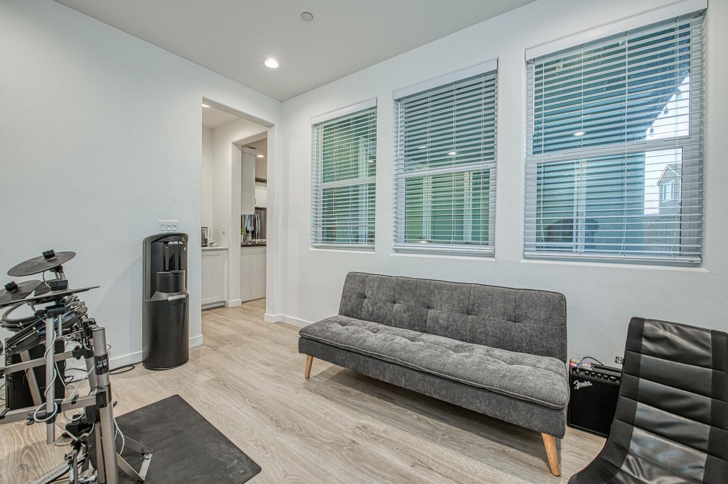 4311 San Miguel Road Madera, CA 93636 - Photo 22 of 79 a living room with furniture and a window
