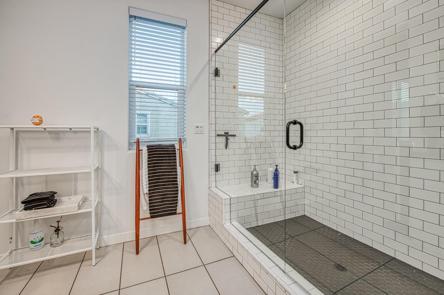 4311 San Miguel Road Madera, CA 93636 - Photo 35 of 79 a bathroom with a bathtub and a sink