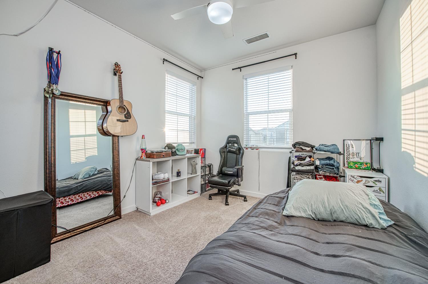 4311 San Miguel Road Madera, CA 93636 - Photo 39 of 79 a bedroom with furniture and a window