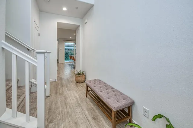 a view of entryway with wooden floor