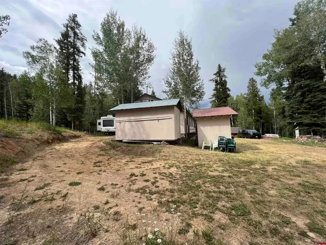 a house with trees in the background