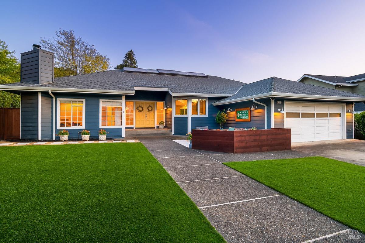 10 Riviera Manor San Rafael, CA 94901 - Photo 1 of 1 a front view of a house with a yard and garage
