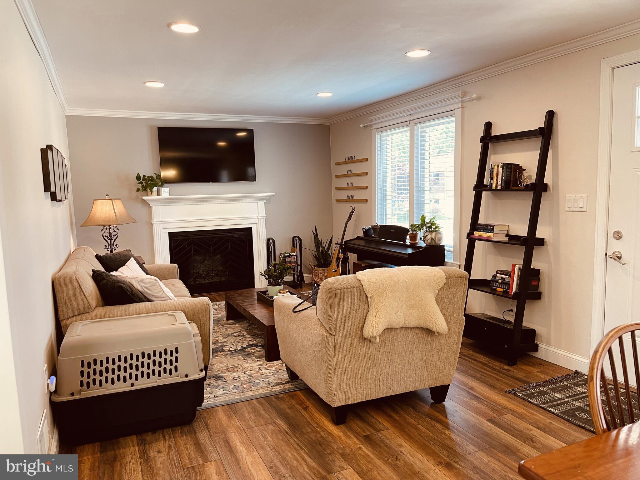 7903 Highpoint Road Parkville, MD 21234 - Photo 11 of 54 Living Room with Wood Fireplace