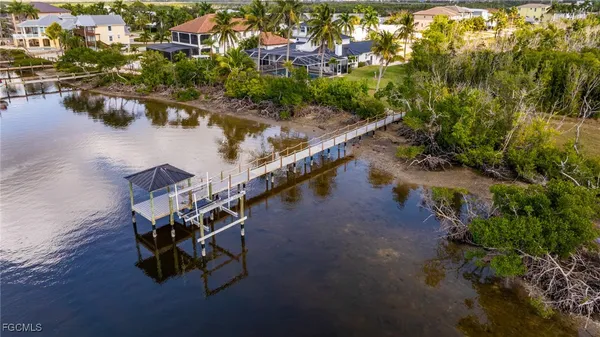 a view of living room with furniture and flower pot
