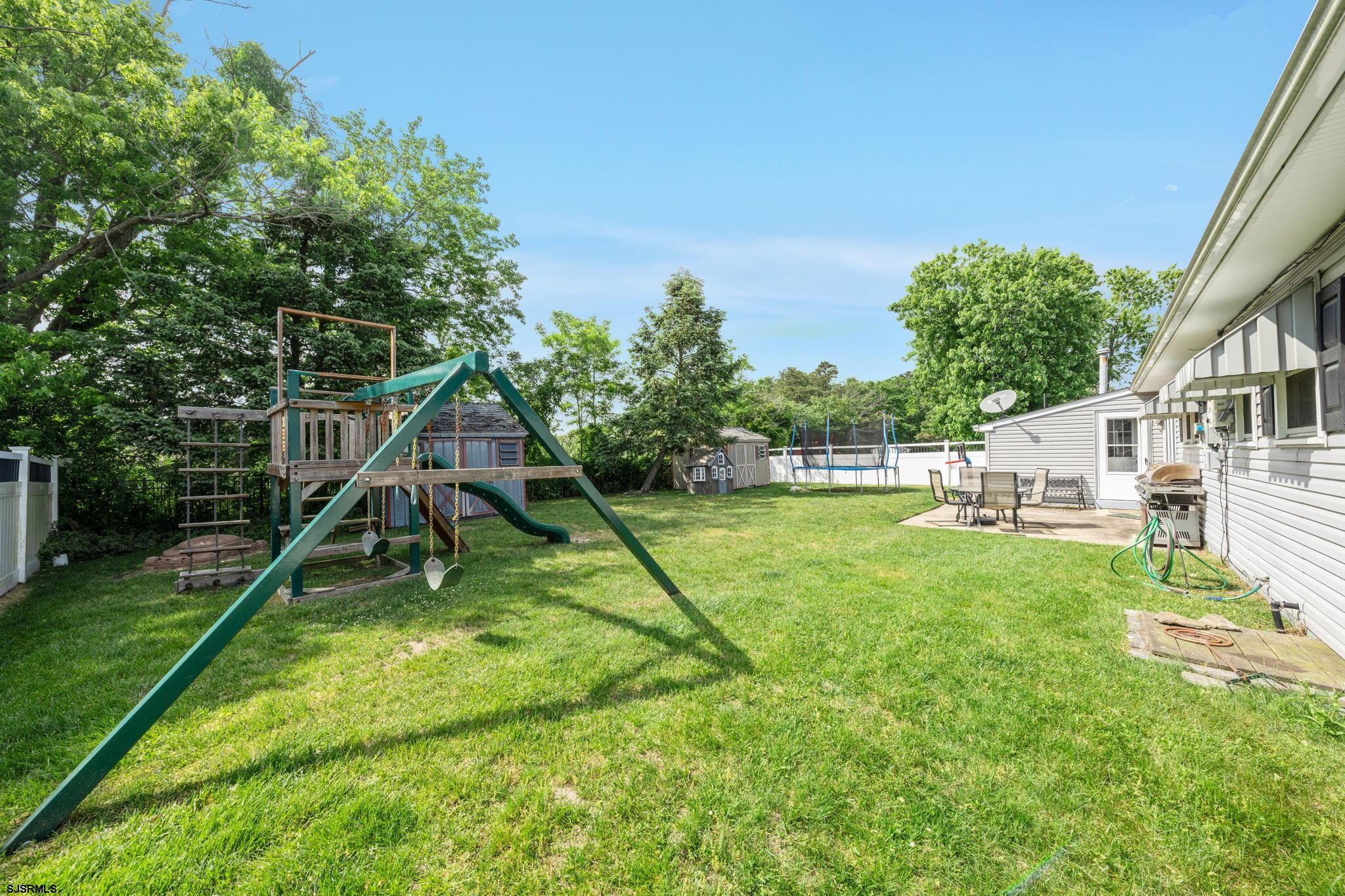 40 Gulph Mill Road Somers Point, NJ 08244 - Photo 19 of 21 a view of a house with a backyard