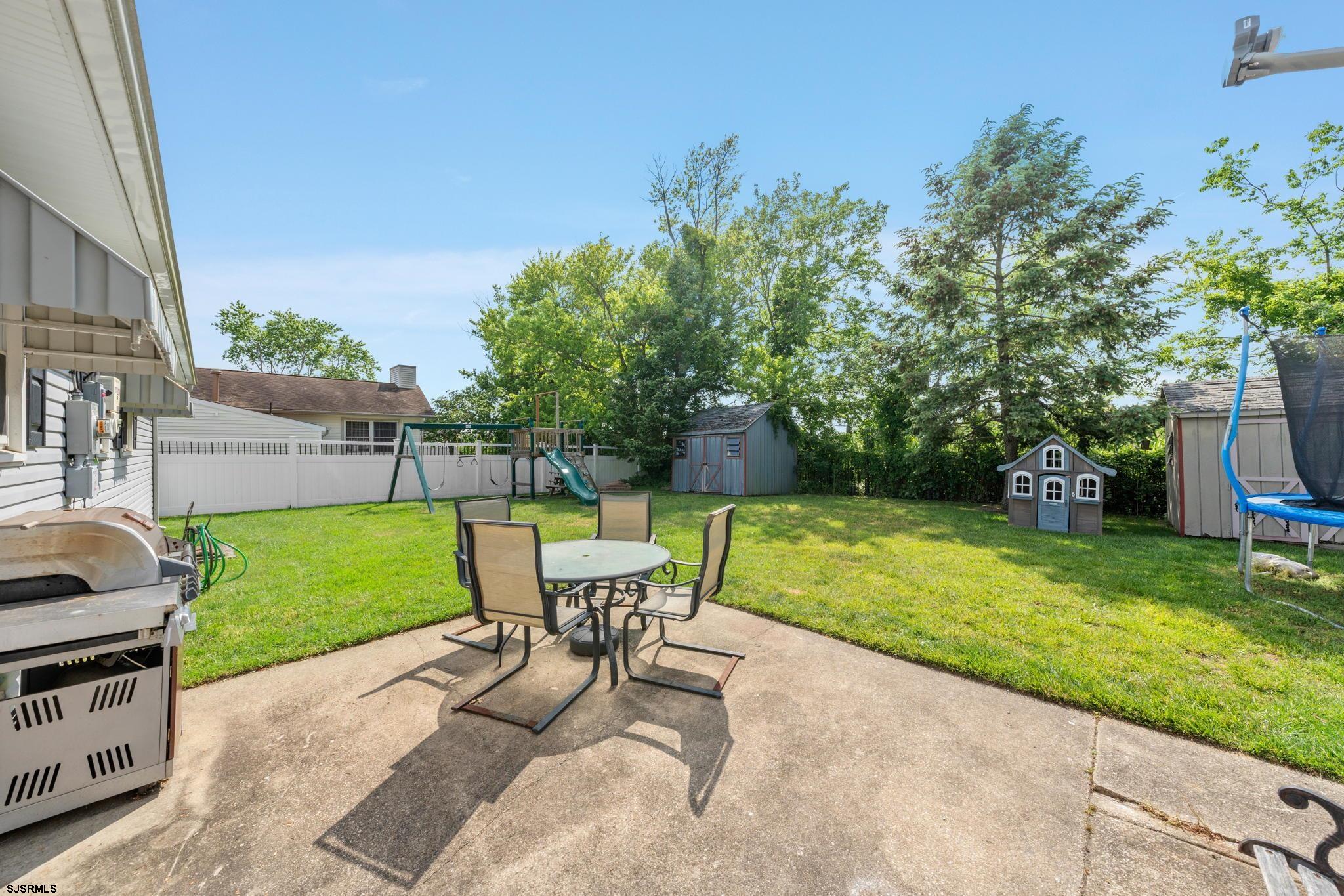 40 Gulph Mill Road Somers Point, NJ 08244 - Photo 20 of 21 a view of a backyard with sitting area