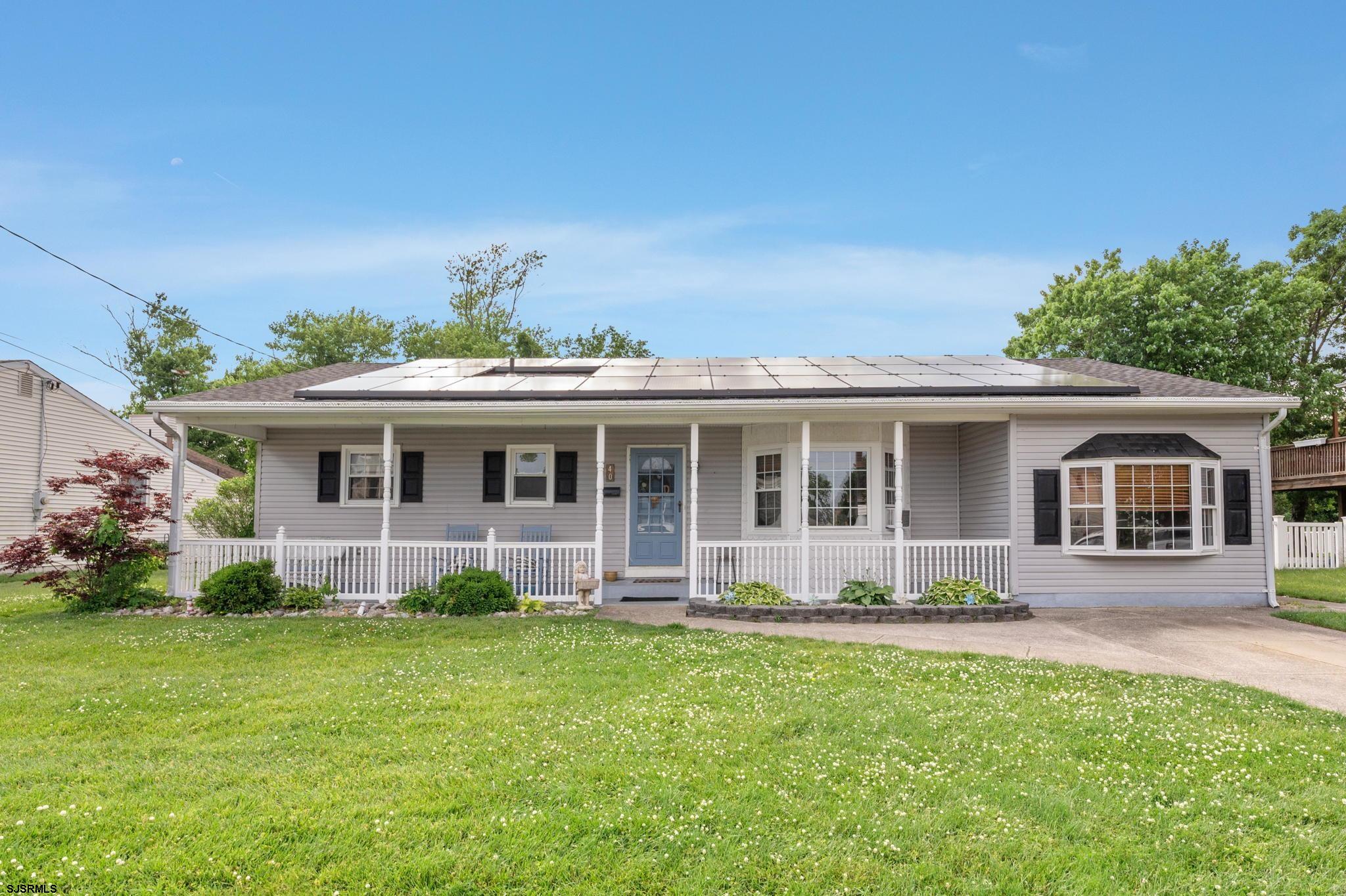 40 Gulph Mill Road Somers Point, NJ 08244 - Photo 2 of 21 a front view of house with yard and green space